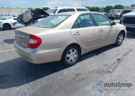 2002 Toyota Camry Le from USA, damaged, VIN 4T1BE32K42U014095